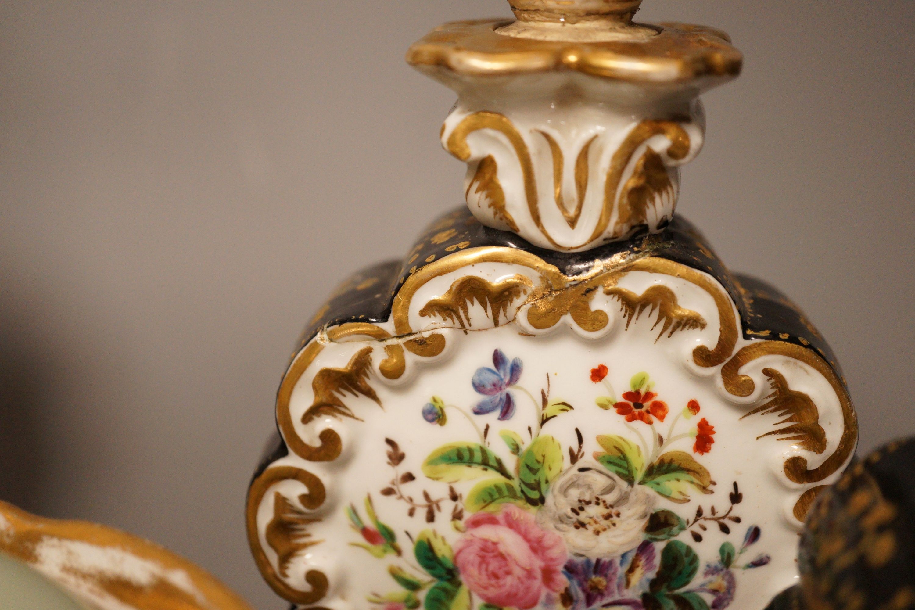 A 19th century Meissen sucrier, a Sevres style Chateau de Chambord plate and a pair of Paris porcelain scent bottles
